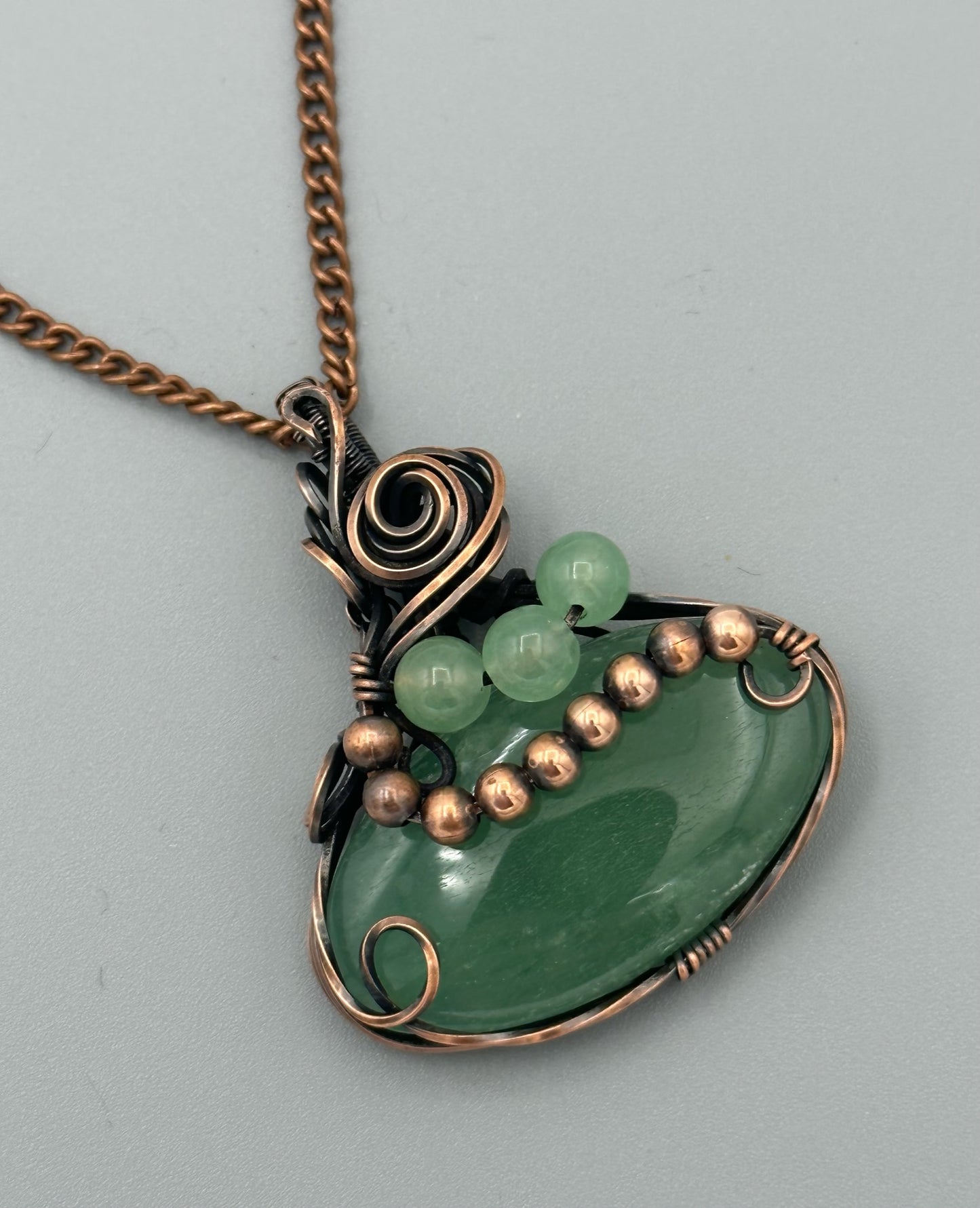 Wire Wrapped Oval Green Strawberry Quartz With Quartz And Copper Beads Pendant