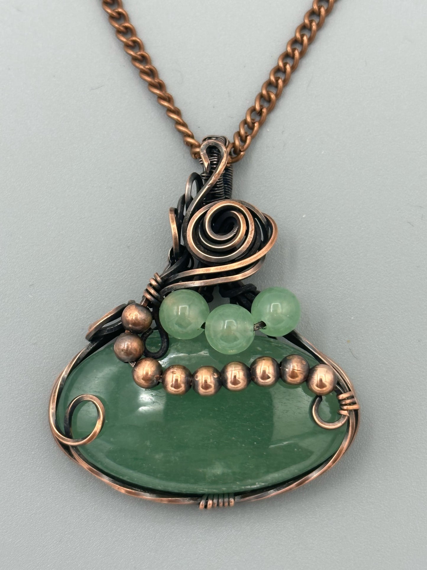 Wire Wrapped Oval Green Strawberry Quartz With Quartz And Copper Beads Pendant