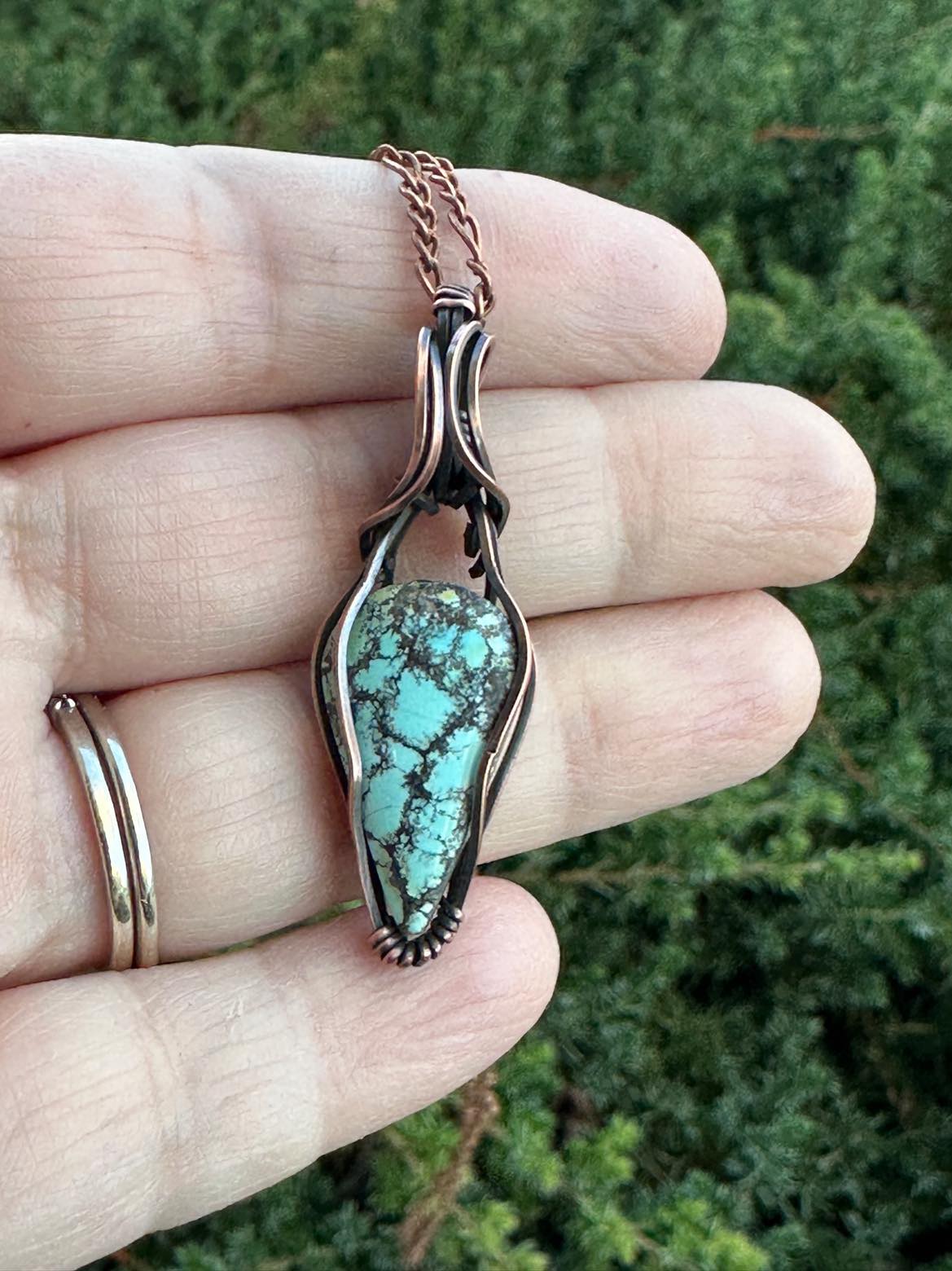 Turquoise Teardrop Pendant Wrapped In Oxidized Copper Wire