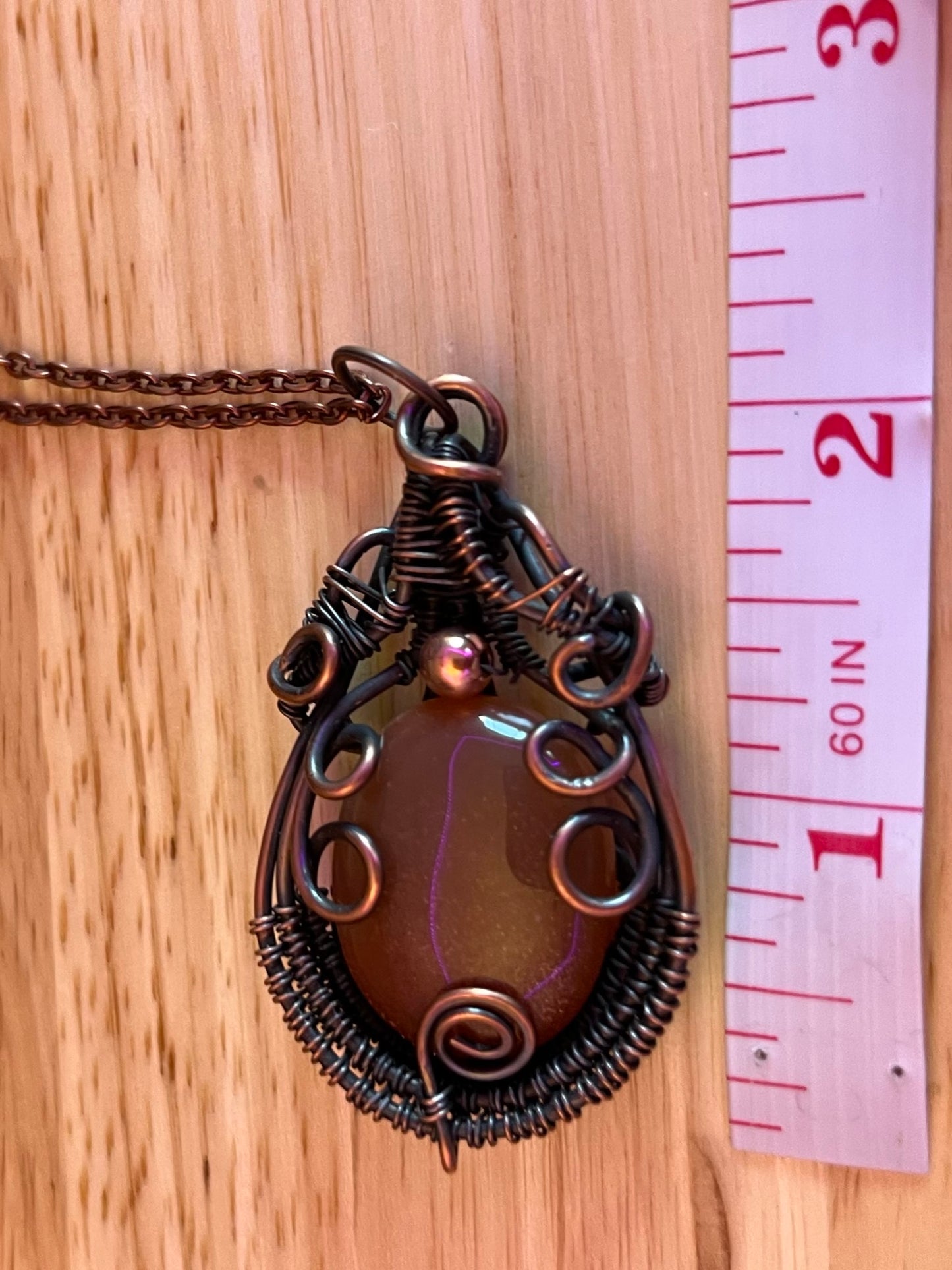 Wire Wrapped Round Peach Moonstone With Copper Bead