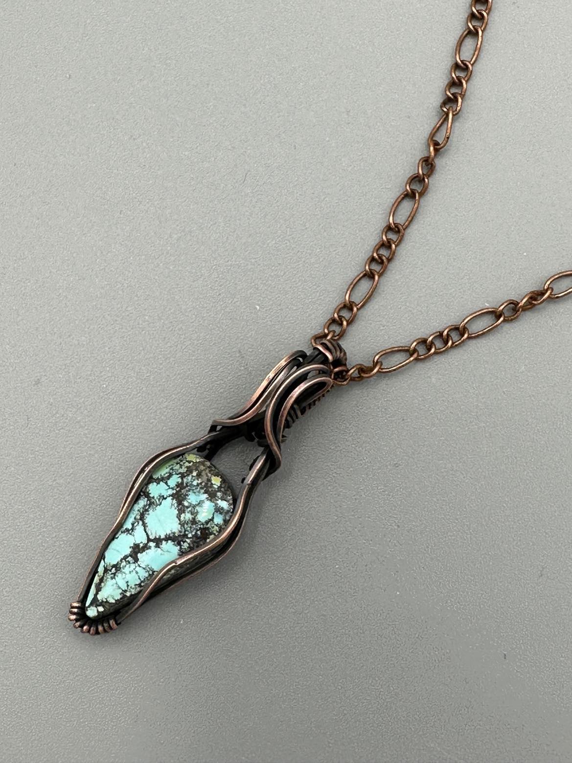 Turquoise Teardrop Pendant Wrapped In Oxidized Copper Wire