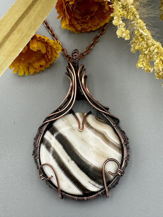 Round Zebra Calcite Wrapped In Oxidized Copper
