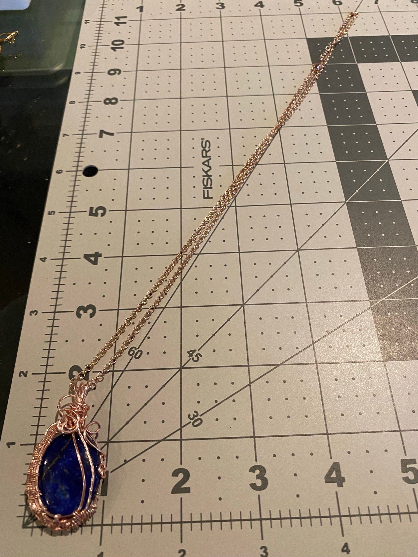Lapis Lazuli Oval Wire Wrapped in Rose Gold Wire Pendant