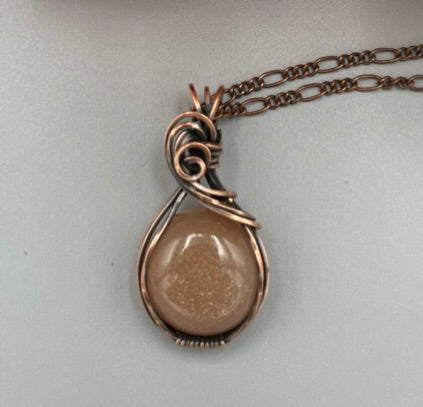 Copper Wire Wrapped Round Peach Moonstone