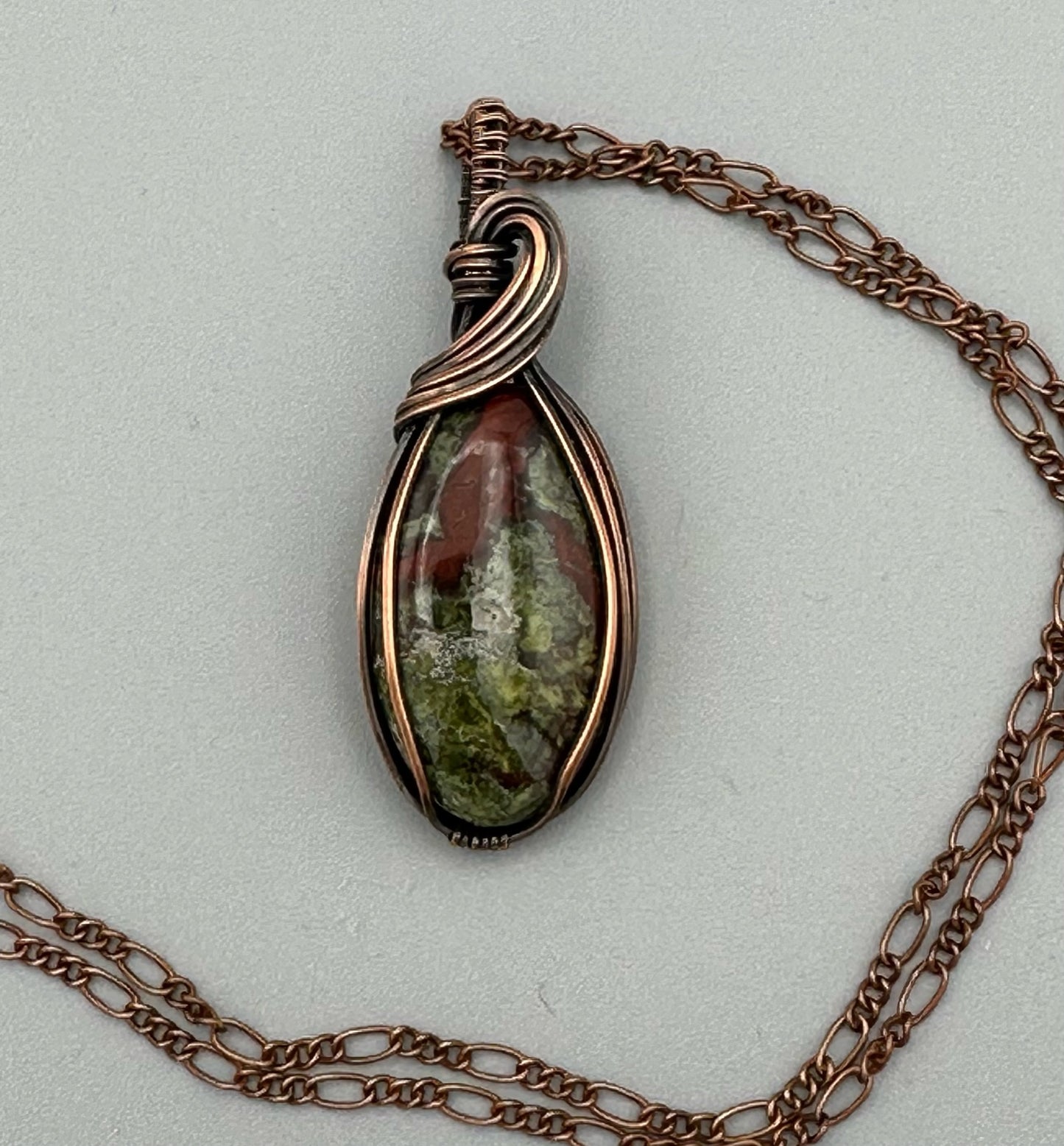 Unisex Oval Dragon Blood Stone Wire Wrapped Pendant