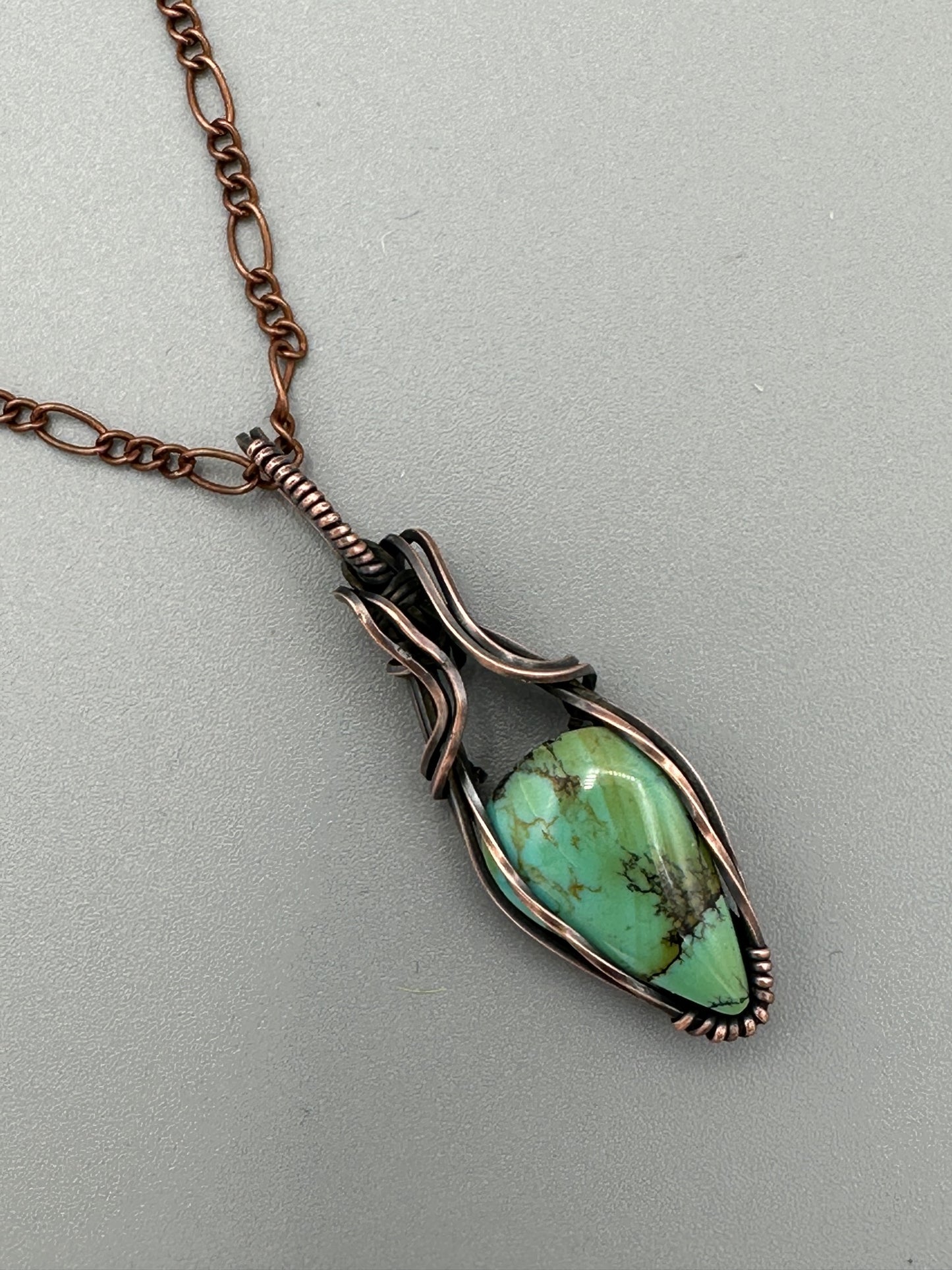 Handmade Turquoise Teardrop Wrapped In Oxidized Copper Wire