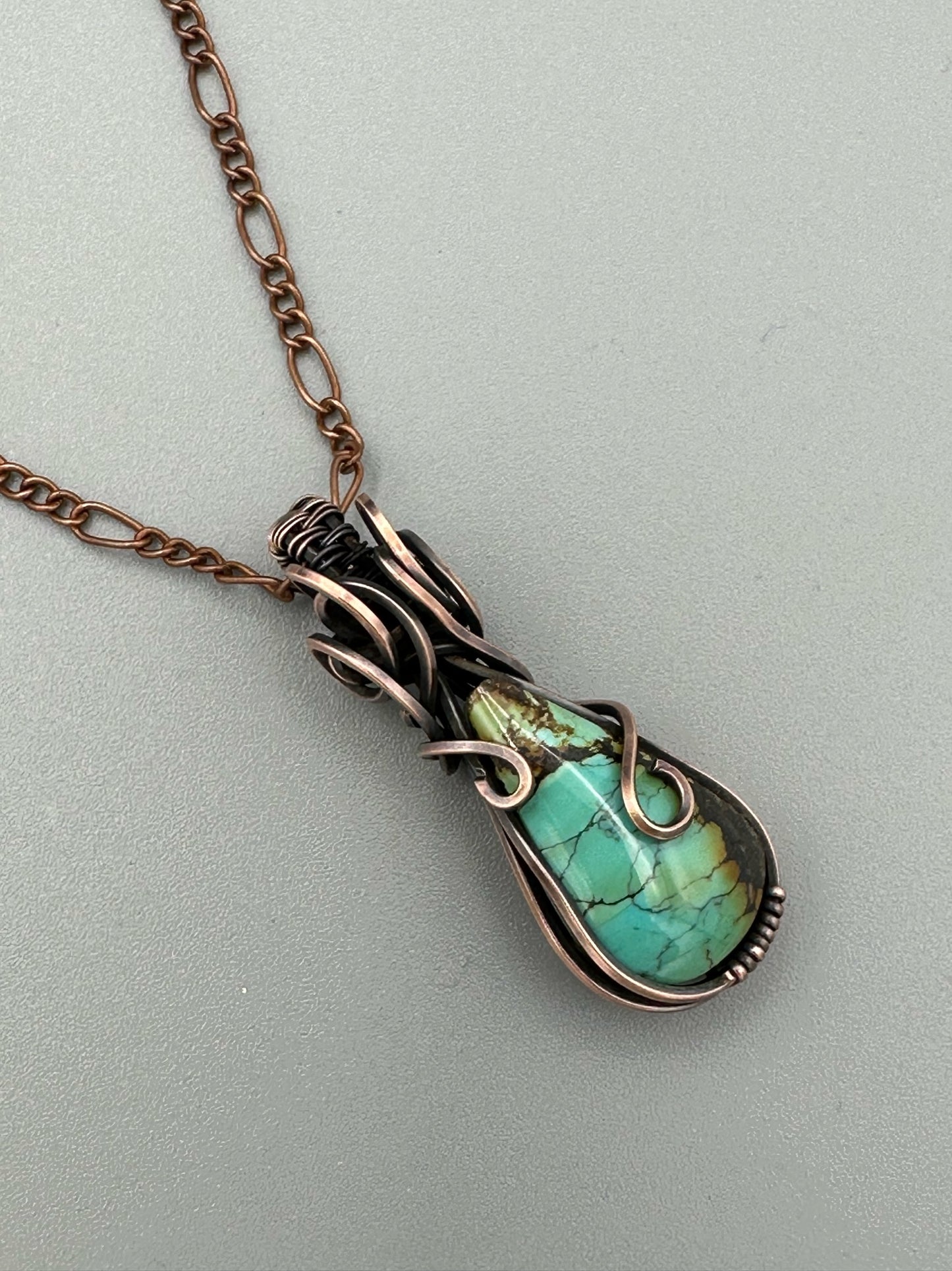 Turquoise Teardrop Wrapped in Oxidized Copper Wire