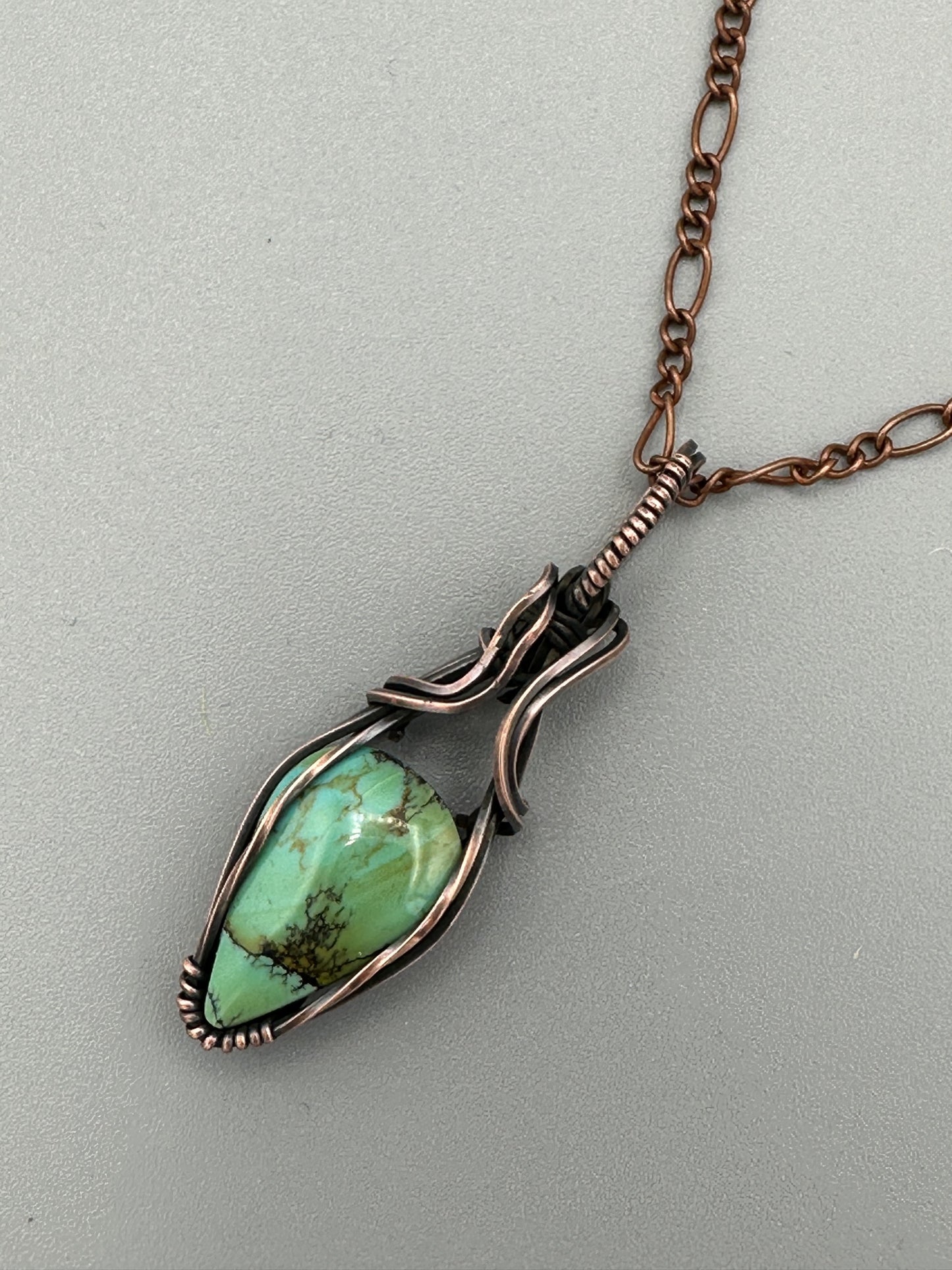 Handmade Turquoise Teardrop Wrapped In Oxidized Copper Wire