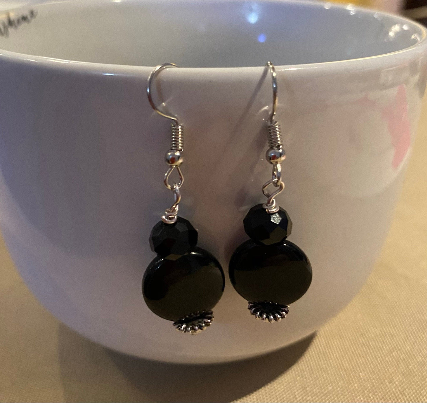 Flat round black boho earrings with faceted round beads