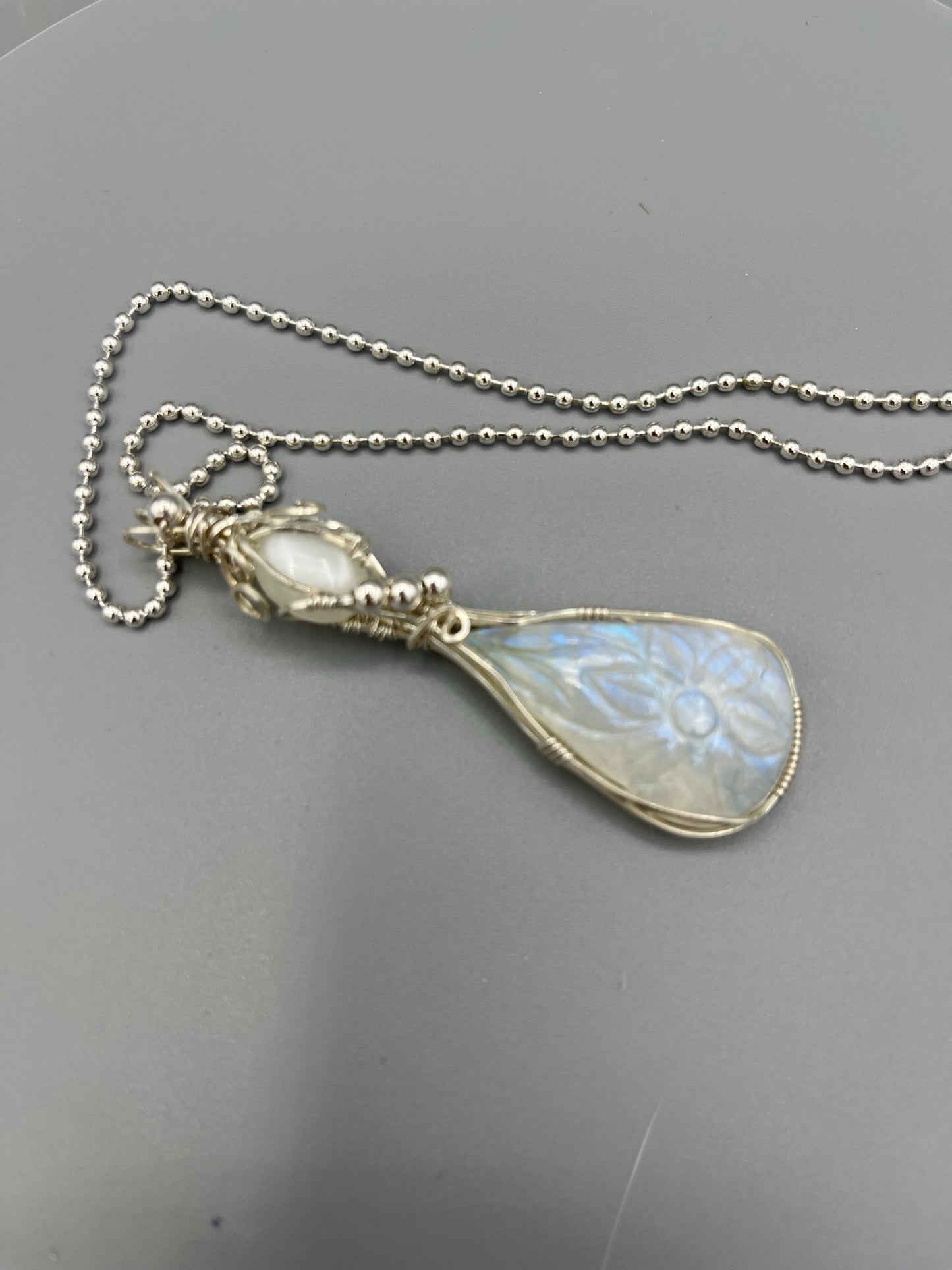 Carved Moonstone Double Wire Wrapped Sterling Silver Pendant