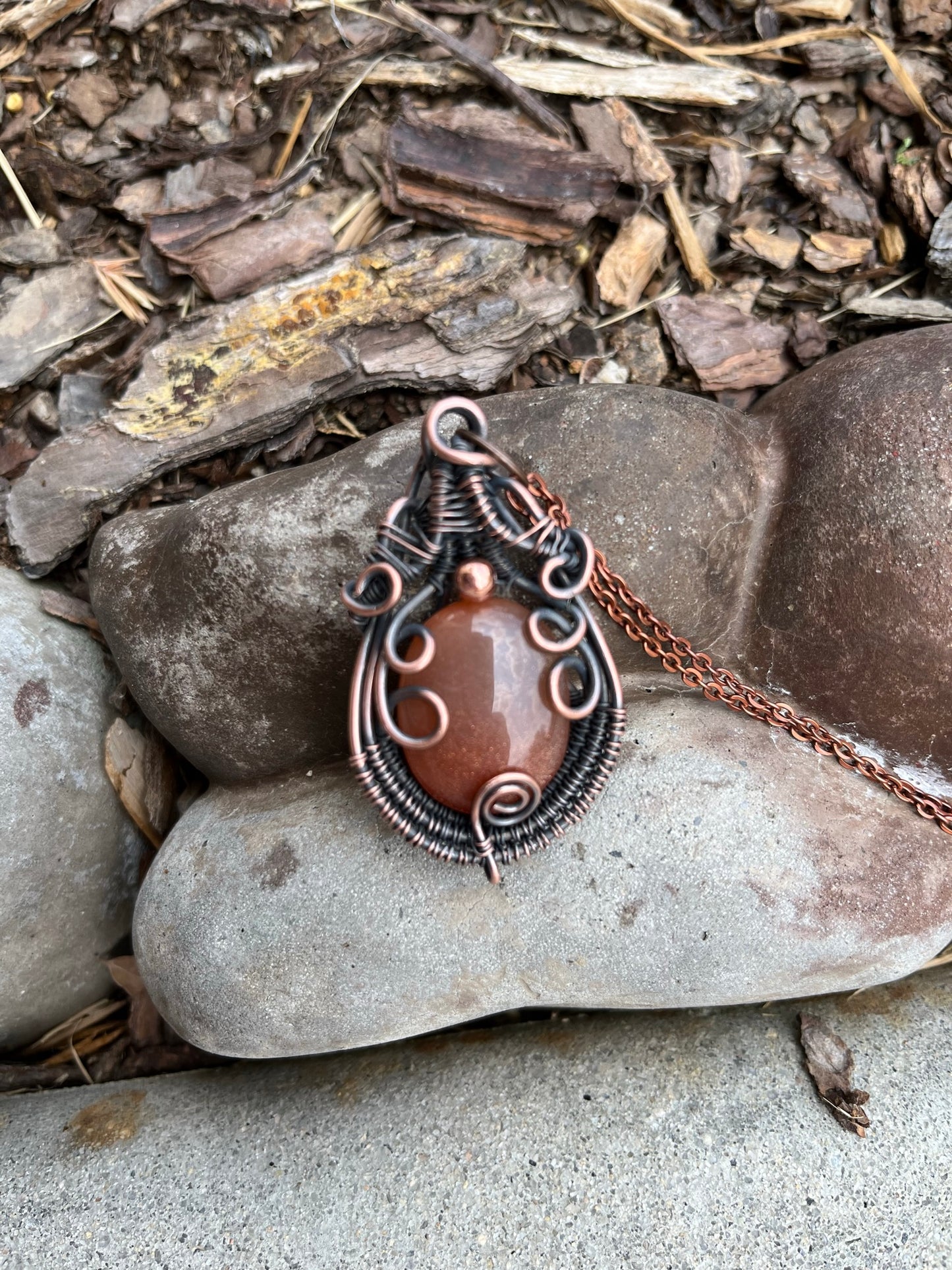 Wire Wrapped Round Peach Moonstone With Copper Bead