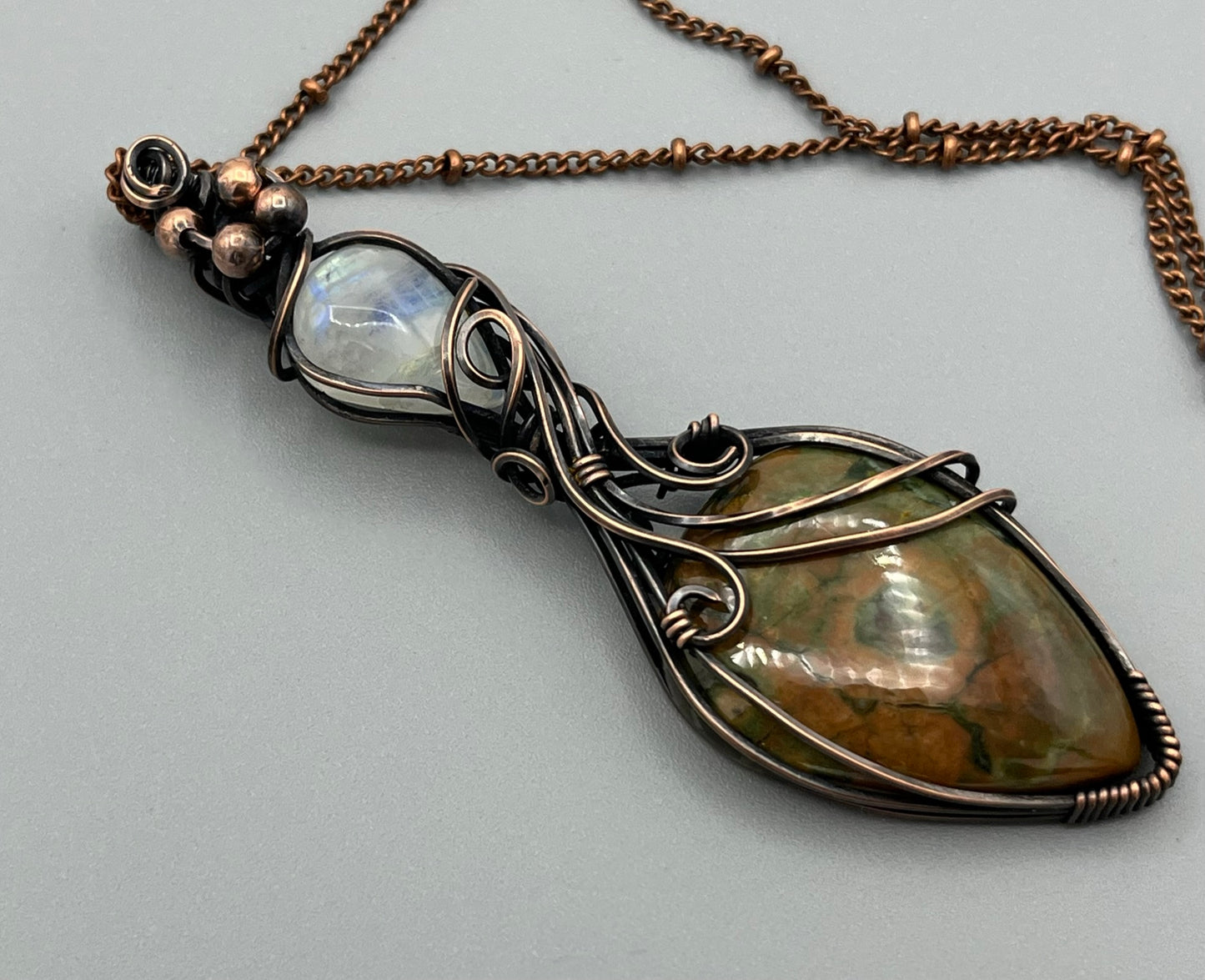 Rhyolite and Rainbow Moonstone Pendant | Copper Wire Wrapped Pendant