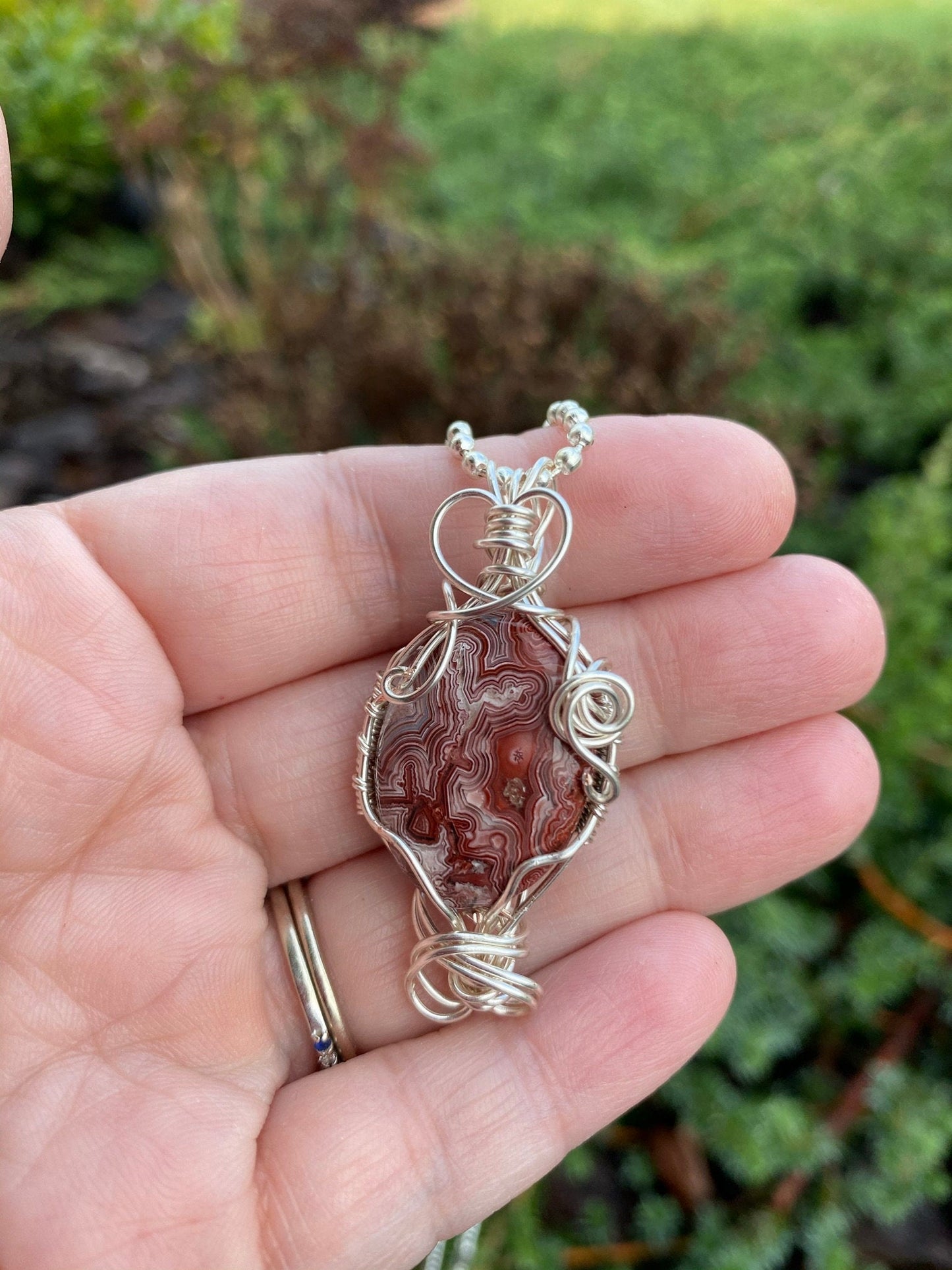 Pink and Red Swirled Wire Wrapped Crazy Lace Oval Pendant