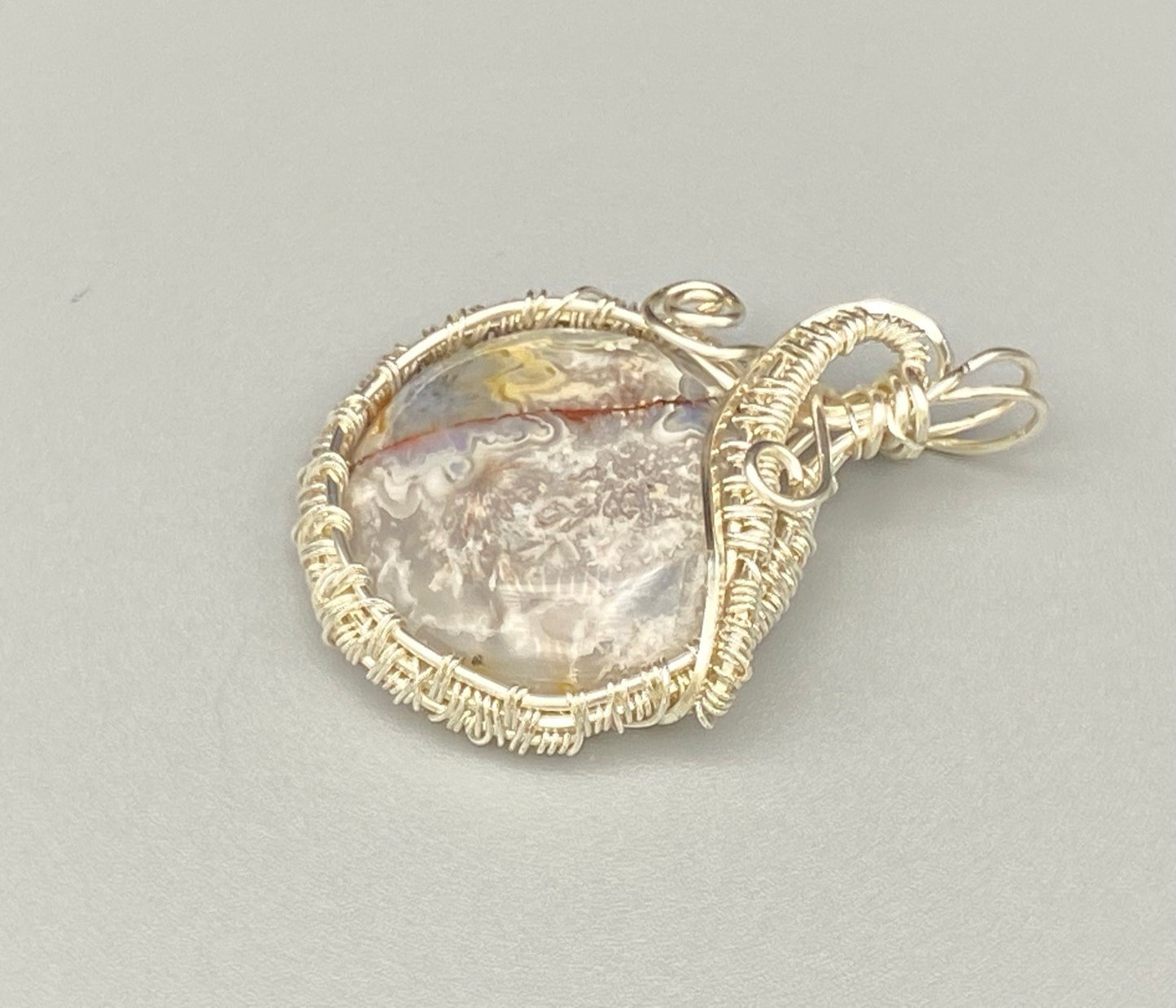 Silversmith Crazy Lace Round Agate Wire Wrapped and Woven Pendant