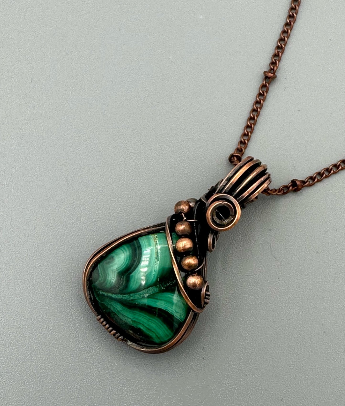 Handmade Wire Wrapped Malachite Pear Shape Pendant With Rosette Motif And Copper Beads