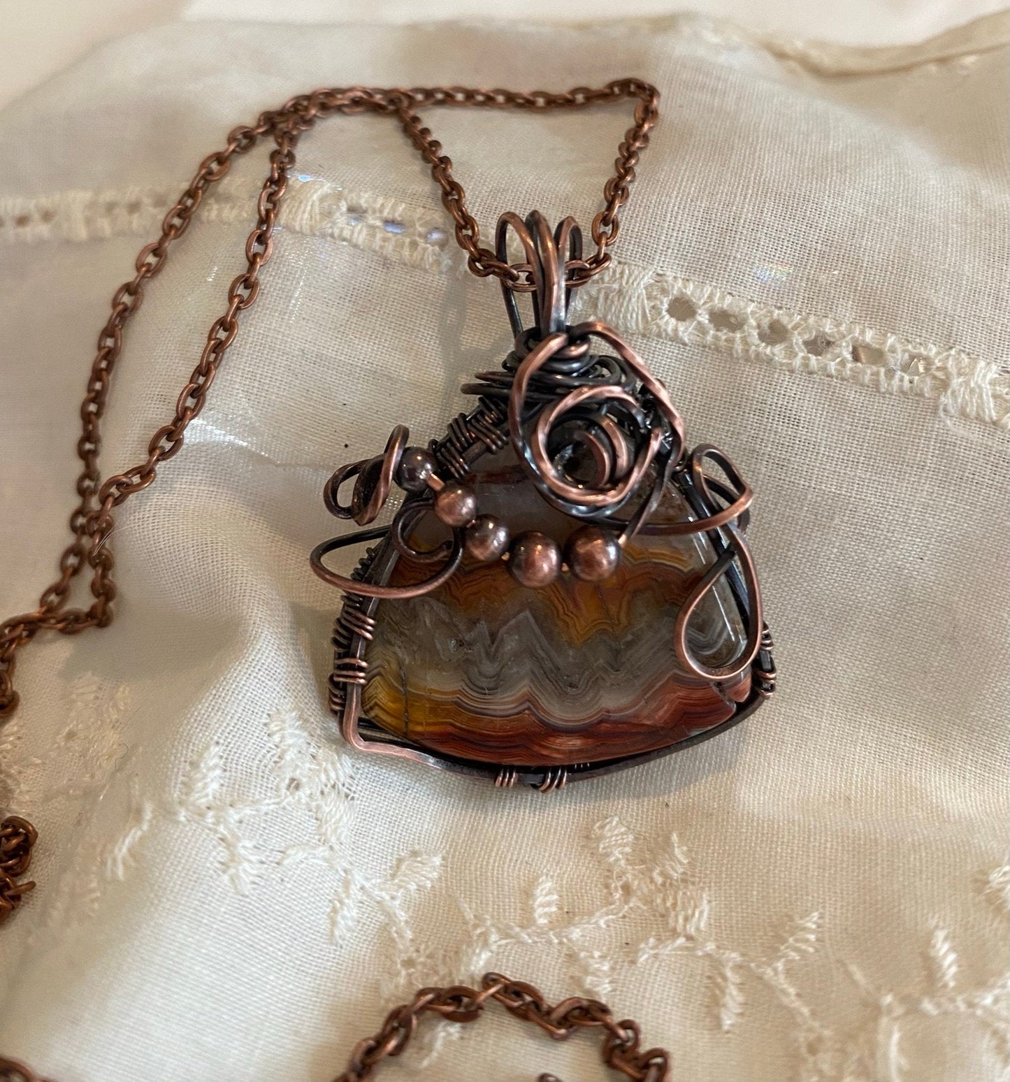 Wire Wrapped Crazy Lace Triangular Pendant