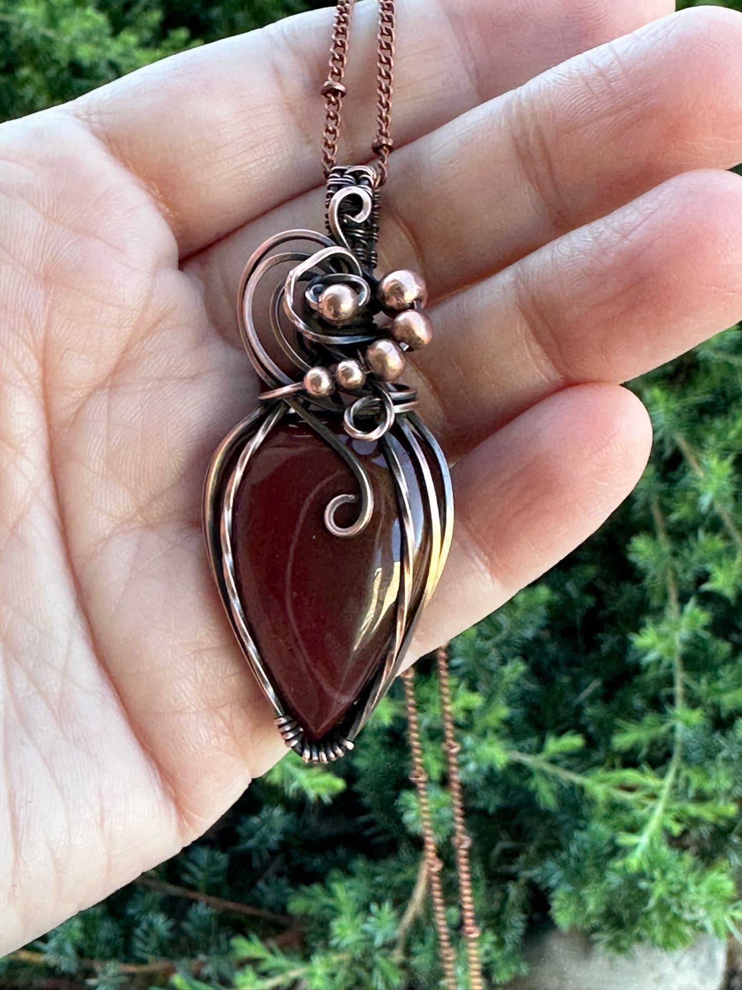 Elegant Red Jasper Wire Wrapped Pendant with Copper Beads