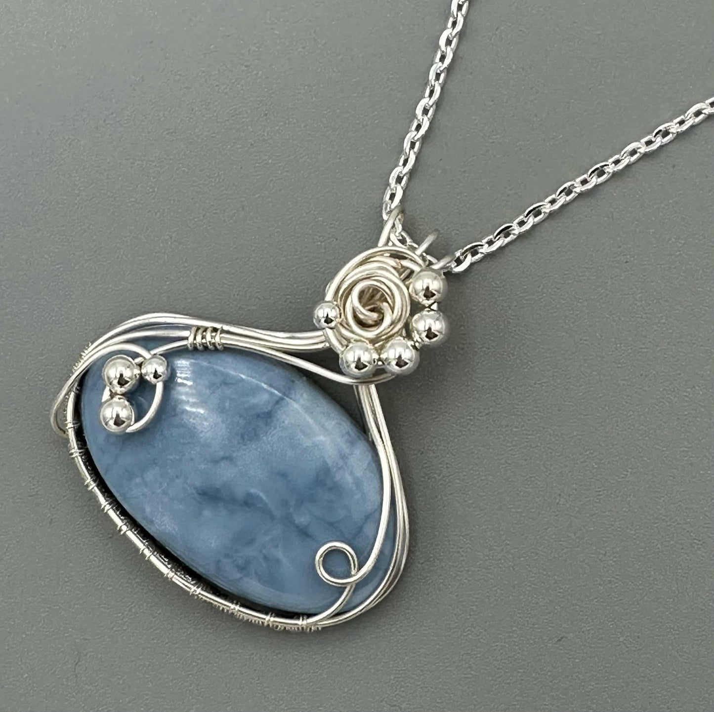 Peruvian Opal Oval Wire Wrapped In Argentium Silver