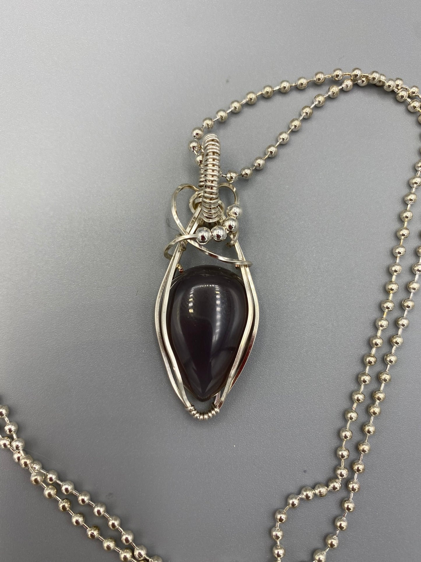 Smoky Gray Teardrop Wire Wrapped in Silver Pendant