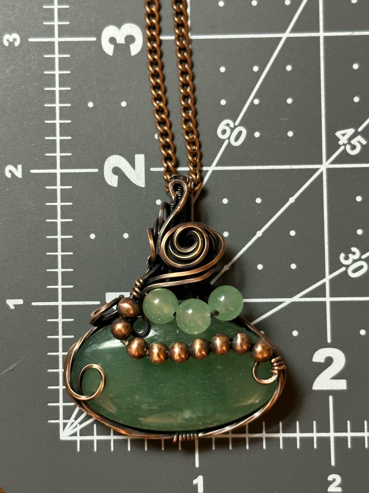 Wire Wrapped Oval Green Strawberry Quartz With Quartz And Copper Beads Pendant